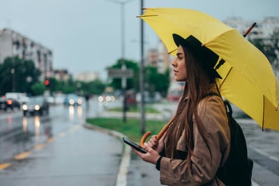 Woman with yellow umbrella